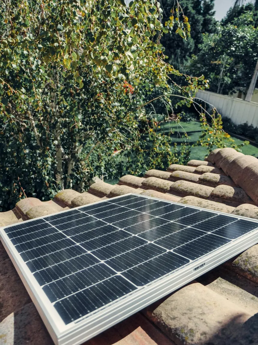 Solar panel on a rooftop representing solar charging capability for the Anker SOLIX C1000 power station